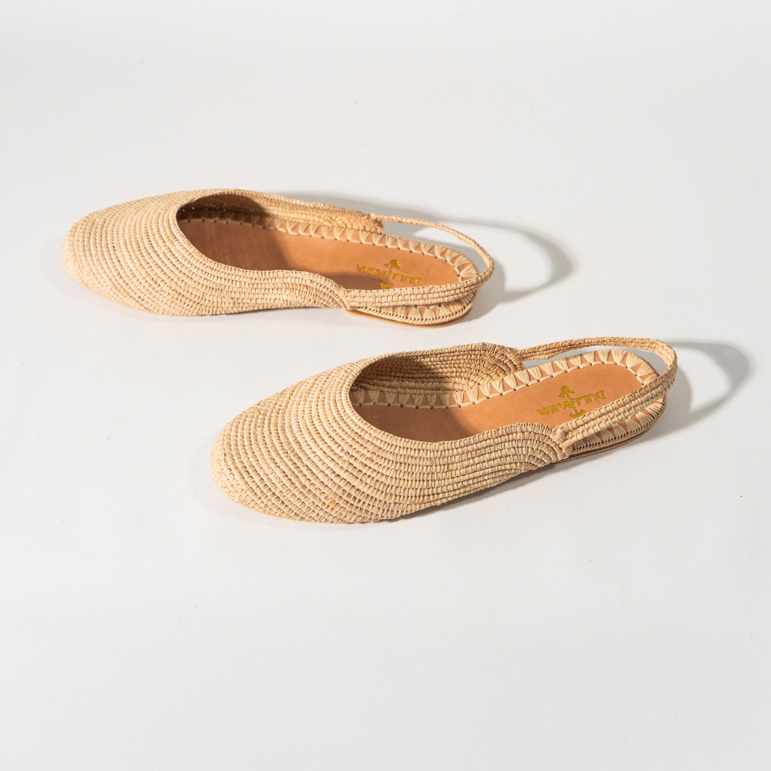 Mazir slingback flats angled from above, showing the leather insole